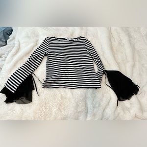 Women black and white striped long sleeve shirt with lace on sleeves and size S.
